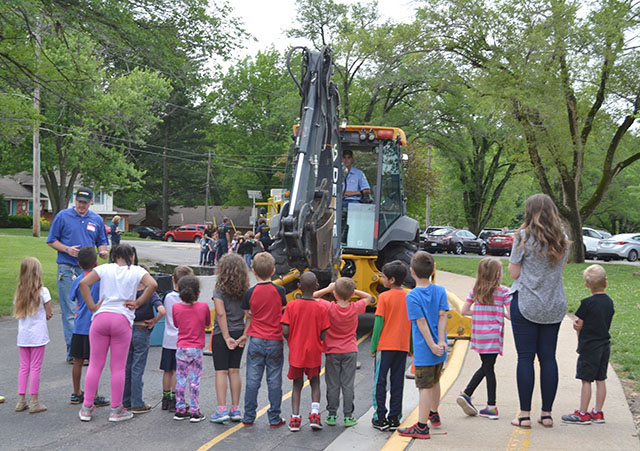 Water Utilities employees provide equipment demonstration for school children.